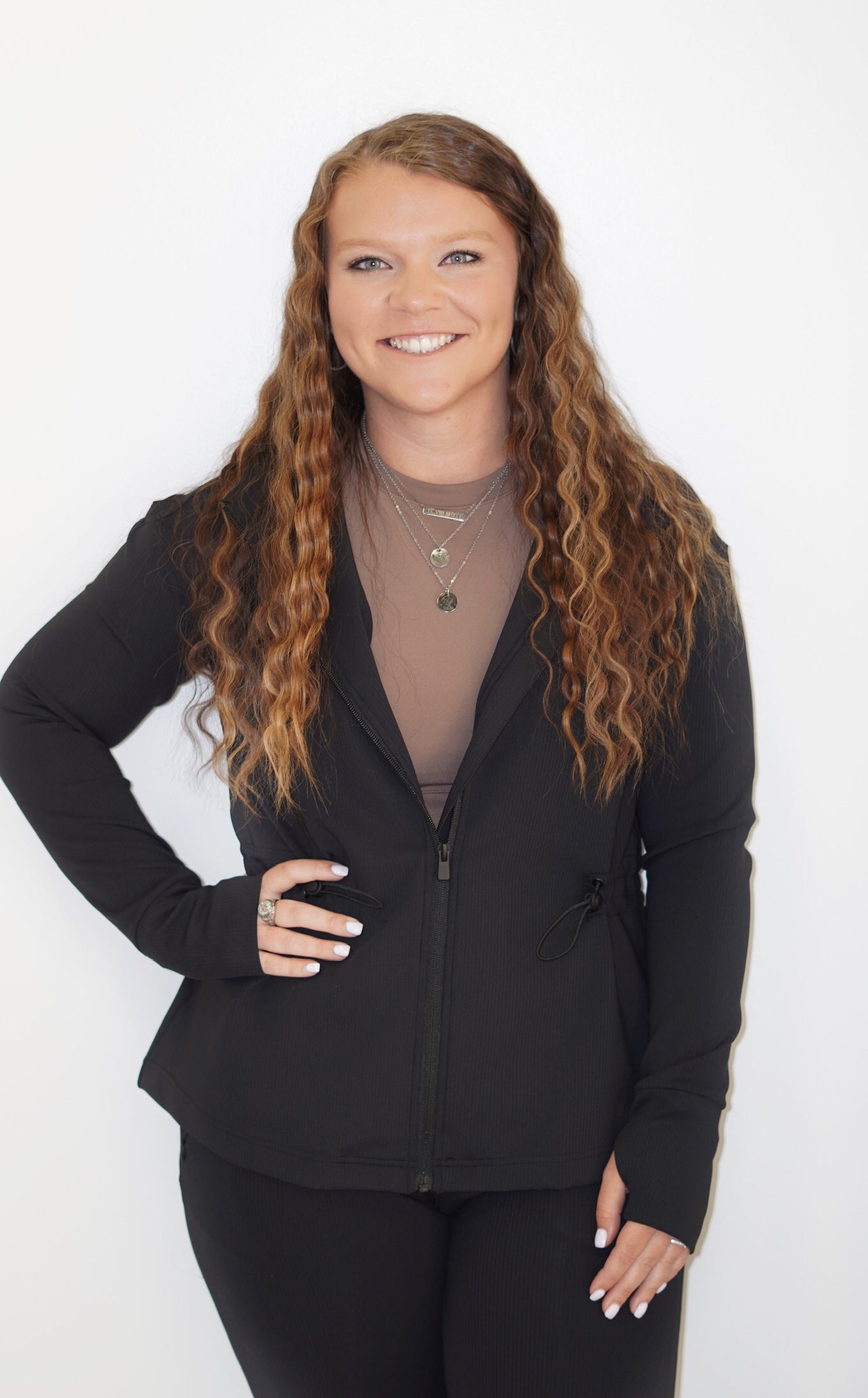Who says you can’t look fabulous while cleaning your house? No one that’s who. So slip into that beautiful Finley Ribbed Hooded Jacket and dust away. Style with our Reyna Ribbed Tapered Pant Finley Ribbed Hooded Jacket Full Zip Up with Hood Long Sleeve with Thumbholes Drawstring Colors: Black and Natural Full Length 80% Polyester, 20% Spandex Machine Wash Cold, Tumble Dry Low, Do Not Iron, Do Not Dry Clean Model is wearing a size medium