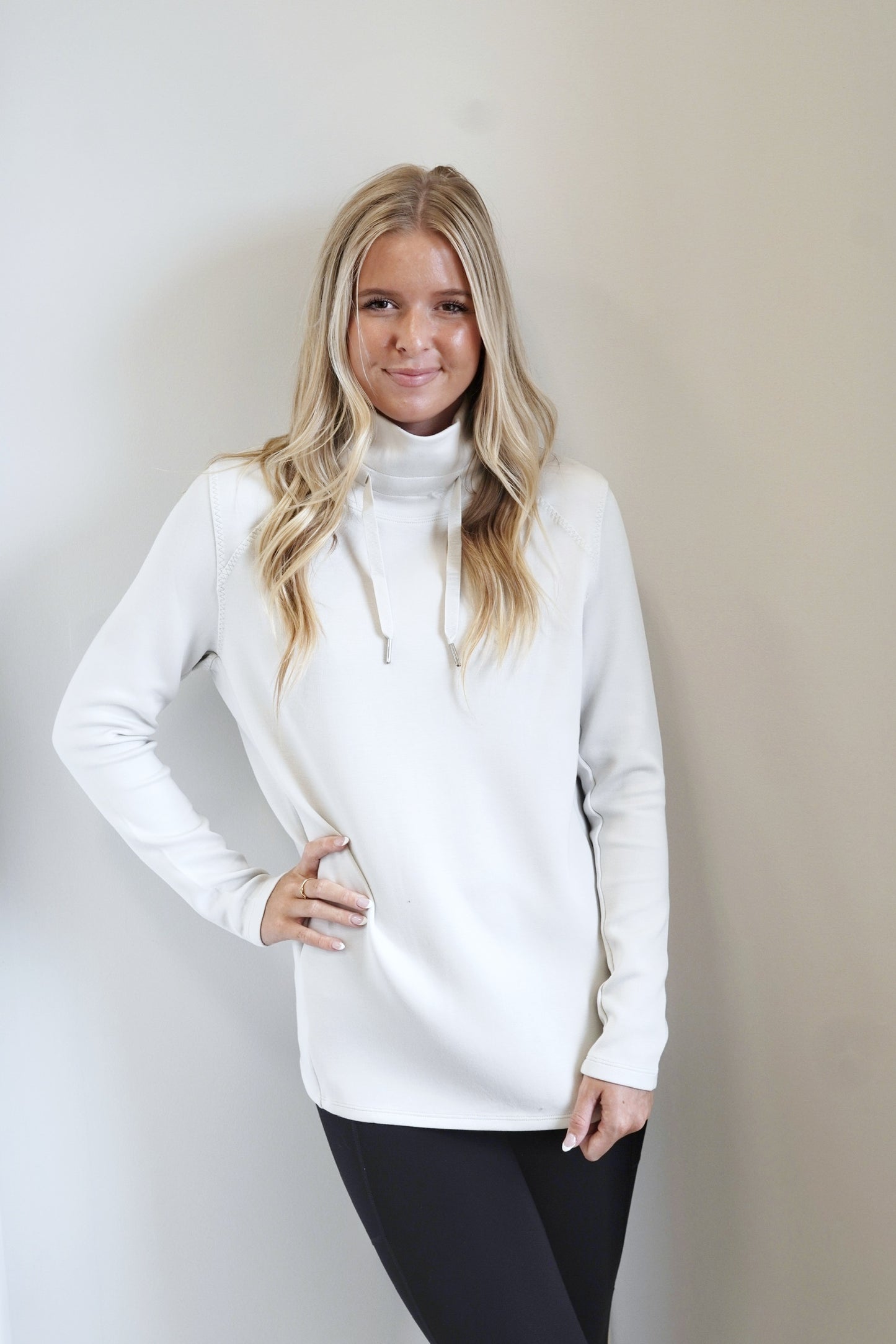 Spanx AirEssentials 'Got-Ya-Covered' Pullover High neck design keeps the cold air out Long Sleeves Colors: Gray Drawstrings at Neckline Full Length Relaxed Fit 47% Modal, 46% Polyester, 7% Elastane