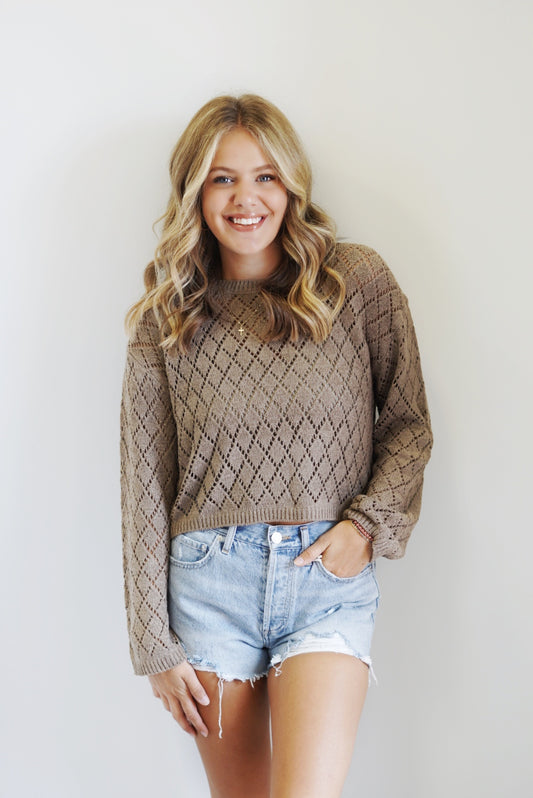 Makenna Knit Sweater Crew Neckline Long Sleeve Color: Oatmeal Skimmer Length Knit Pattern Fabric Content: 54% Acrylic 46% Recycled Nylon Model Is Wearing Size Small