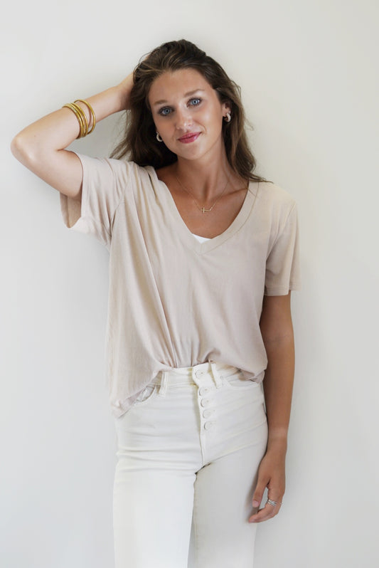 Lily Girlfriend V-Neck Tee V-Neckline Relaxed Fit Short Sleeves Colors: Black, Birch, Striped White and Birch Machine wash cold, turn inside out, gentle cycle, wash with like colors, do not bleach, tumble dry low, warm iron if needed, do not dry clean Whisper Cotton Jersey: 100% Cotton Model is wearing a size small