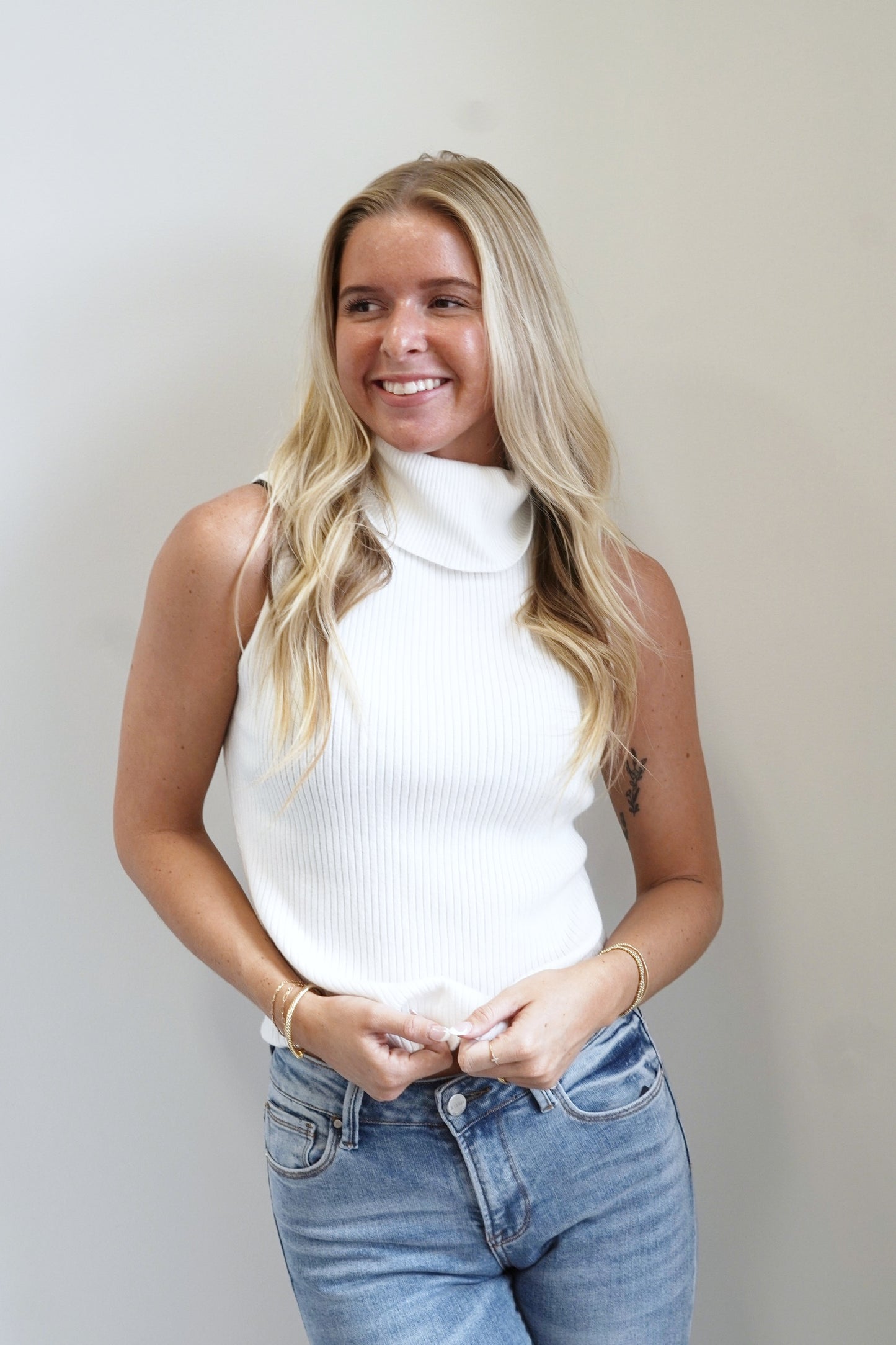 Tiana Turtleneck Sleeveless Top Turtleneck Sleeveless Knit Fabric Colors: White Fitted 46% Polyester, 23% Nylon, 32% Viscose