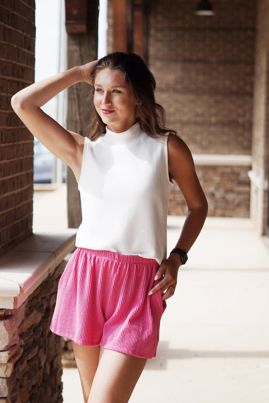 Light-as-air fabric Smocked Neckline Fine knit structure offers maximum softness Optimal air flow and circulation for all-day comfort 4-way stretch for easy movement, White Color