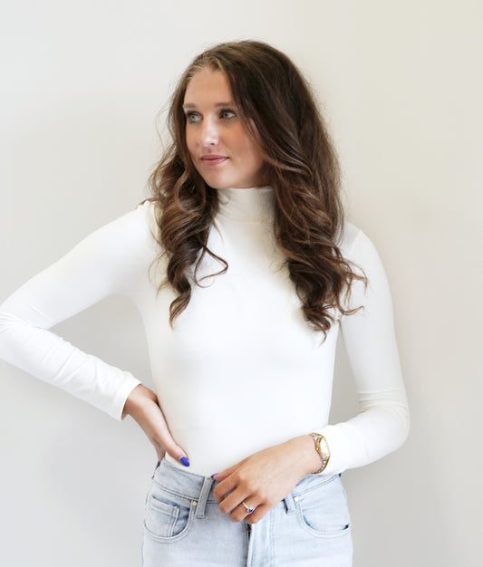 Mae Mock Neck Bodysuit Mock Neckline Long Sleeves Ivory Color Bodysuit w/ Button Clasps Fitted
