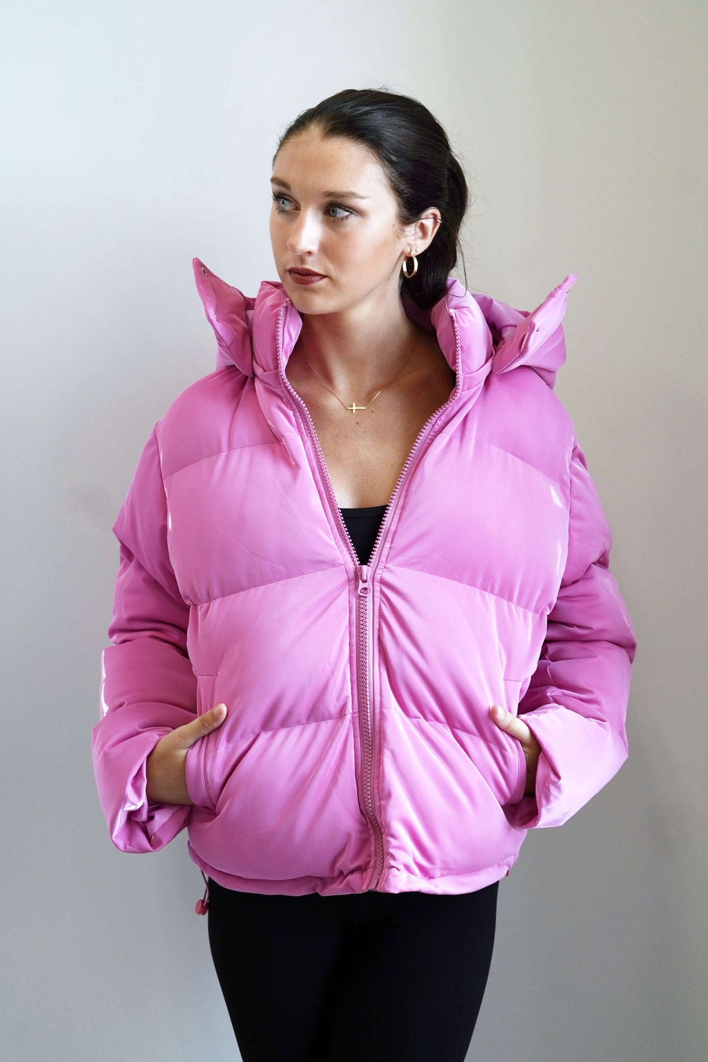 Hadley Hooded Shiny Puffer Jacket Collared Neckline Long Sleeves Detachable Hood Colors: Pink Puffer Style Zipper Oversized Look Skimmer Length Pockets 55% PU, 40% Polyester, 5% Spandex