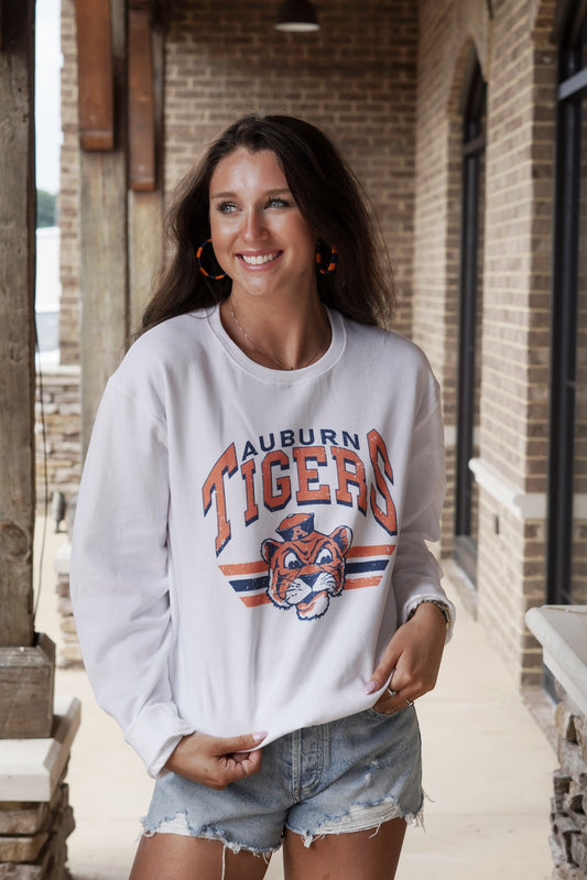 Aubie Auburn Vintage Graphic Crew Neck Crew Neckline Long Cuffed Sleeves "Auburn Tigers" print Aubie Pictured White Base Blue and Orange Writing Relaxed Fit Full Length 50% Cotton, 50% Polyester