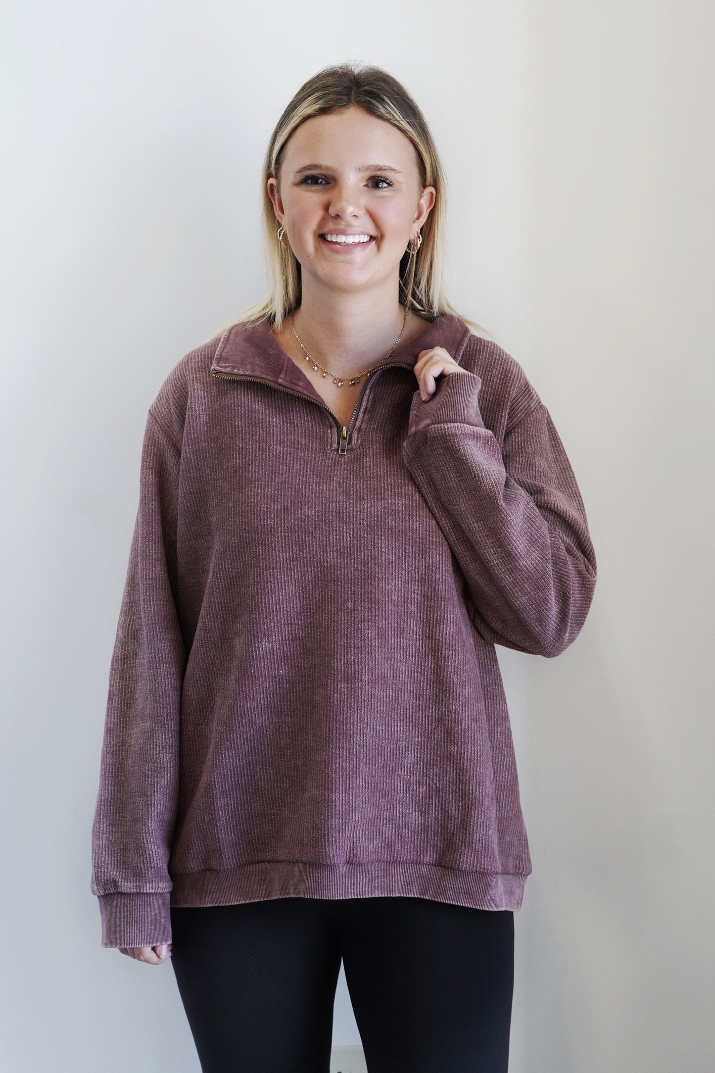 Kara Quarter Zip Ribbed Sweatshirt Quarter Zip Collared Neckline Long Cuffed Sleeves Washed Ribbed Material MulberryColor Relaxed Fit Full Length 100% Cotton Care: Hand wash cold, Do not bleach, Dry flat, Iron low, Do not dry clean, Wash separately