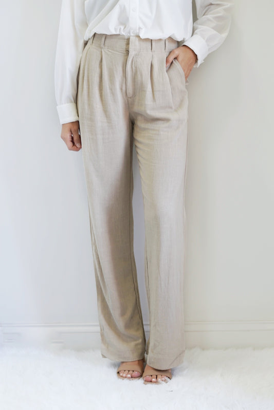 Farah Trouser Pant Full Ankle Length Relaxed Fit Belt Loops Colors: Black, Sand Machine wash, turn inside out, gentle cycle, wash dark color separately, do not bleach, hang to dry, warm iron if needed Rayon Linen: 86% Rayon 14% Linen Model is wearing a size small