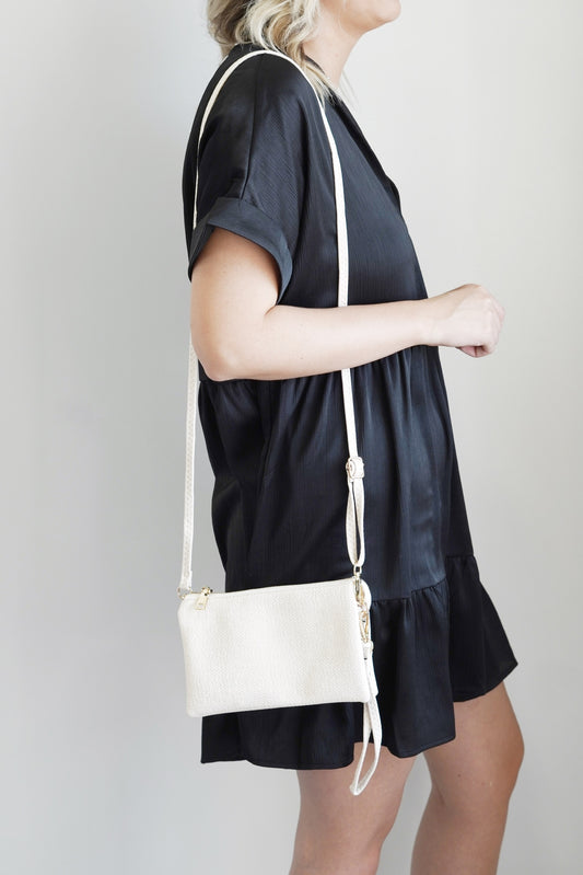 Riley Neutral Crossbody Wallet 5 Compartments 6 Card Slots 1 Interior Zipper Zipper Closer Colors: Linen One Crossbody Strap, One Wristlet Strap - Both Removable 8.5 x 5.5in