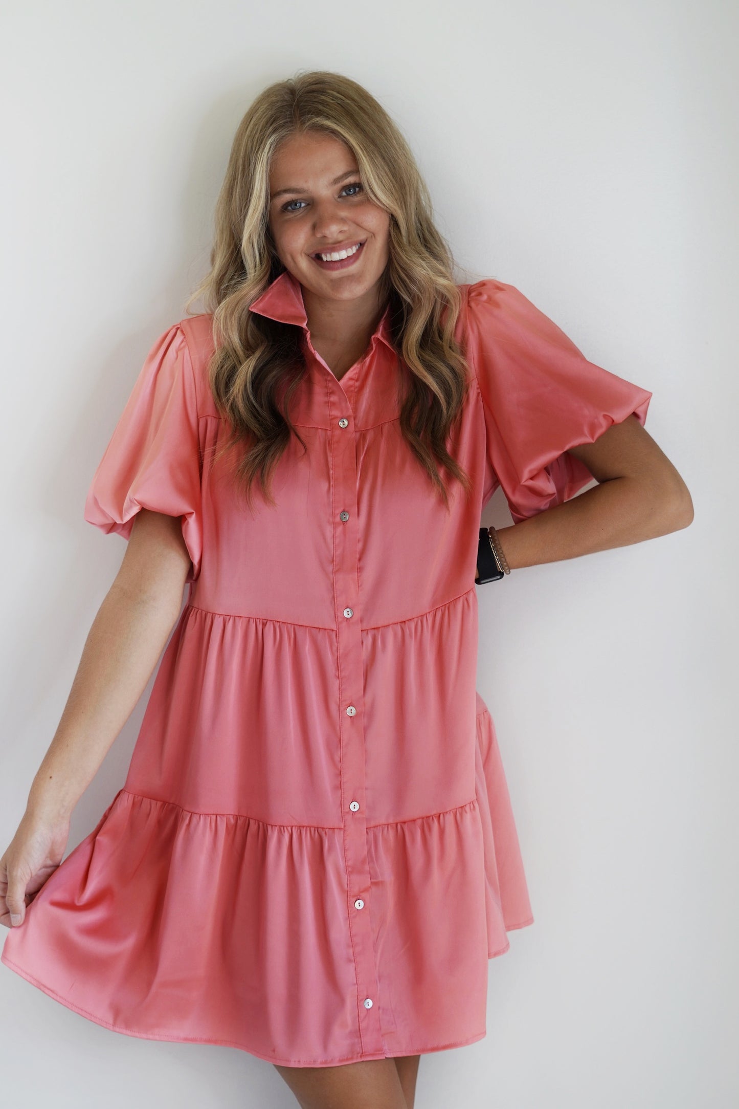 Mia Satin Puff Mini Dress Button Down Collar Short Sleeves with Puff Color Pink 95% Polyester 5% Spandex Hand Wash Cold, Do Not Bleach, Hang or Line dry, Low Iron if Needed Model is wearing size: Small