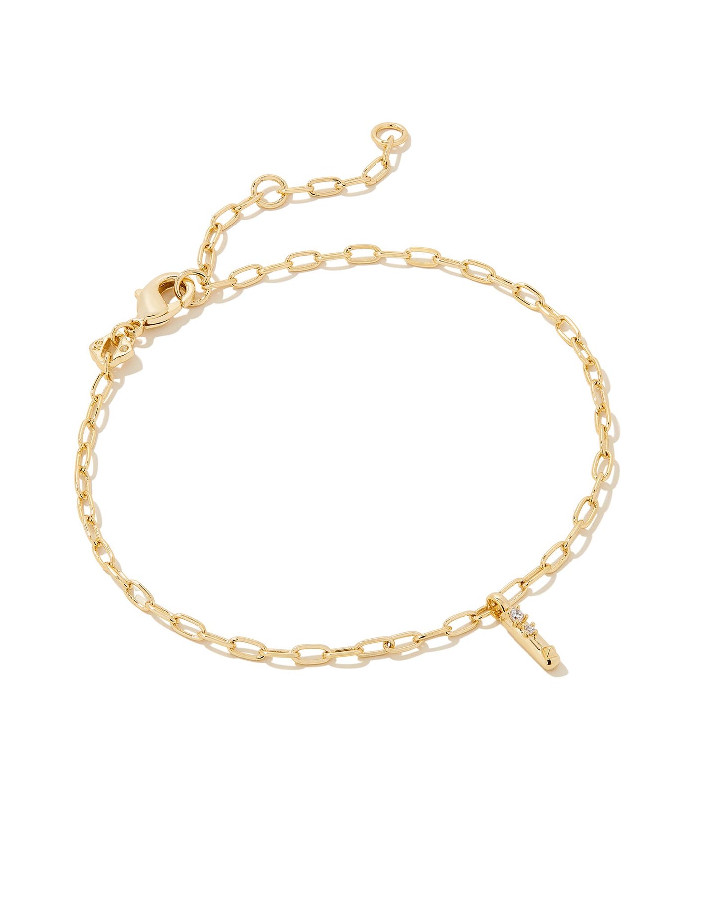 Add a personal touch to your wrist stack with the Crystal Delicate Chain Bracelet in White Crystal, our first Fashion Jewelry initial bracelet. Featuring a dainty chain and letter charm with a hint of sparkle, this bracelet is the perfect way to celebrate the ones you love—including yourself!  Dimensions- 6.5' CHAIN WITH 1.5' EXTENDER, 0.45'L X 0.26"W PENDANT Metal- 14K Gold plated over brass Closure- Lobster Clasp Material-  White CZ Letter I