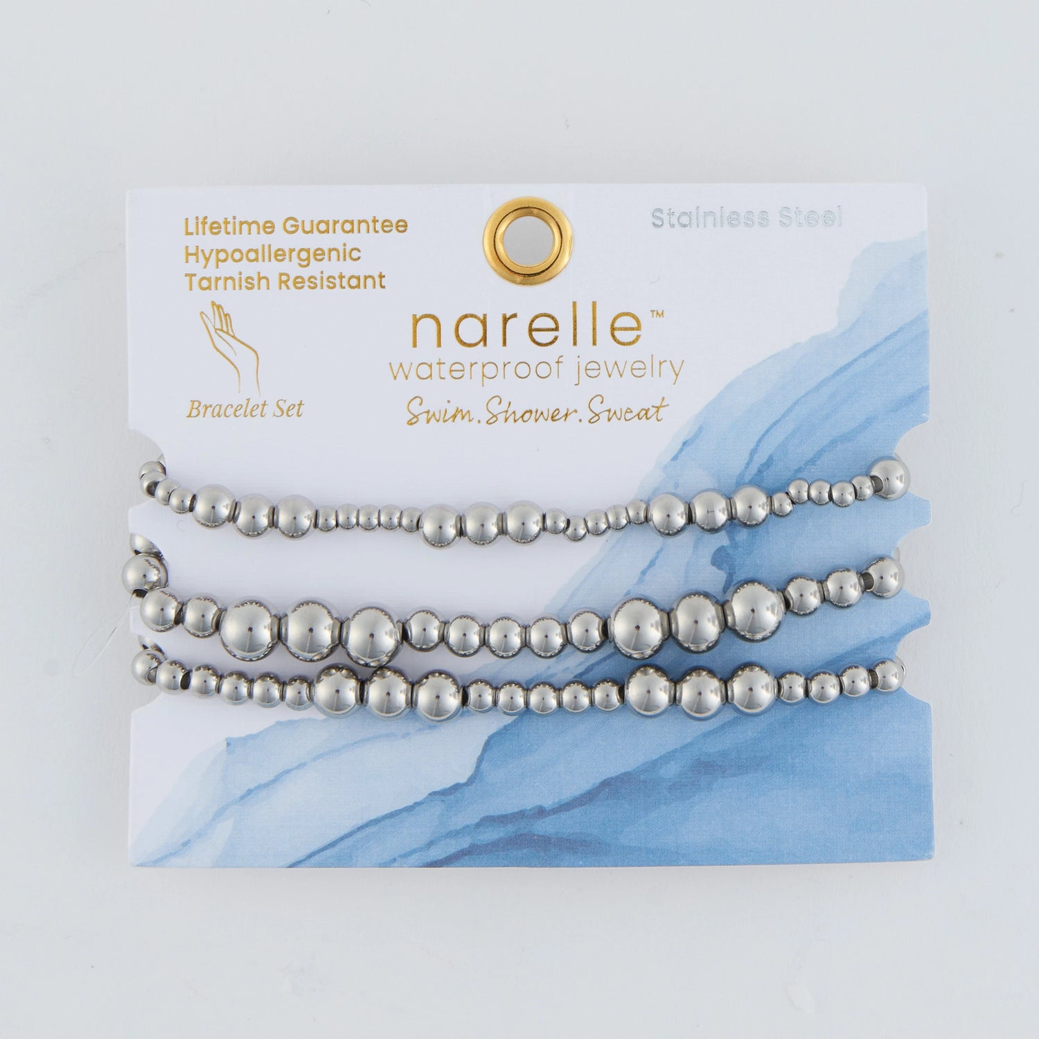 3-piece stack features stretch-fit beaded bracelets with graduated ball sizing in Sliver. 