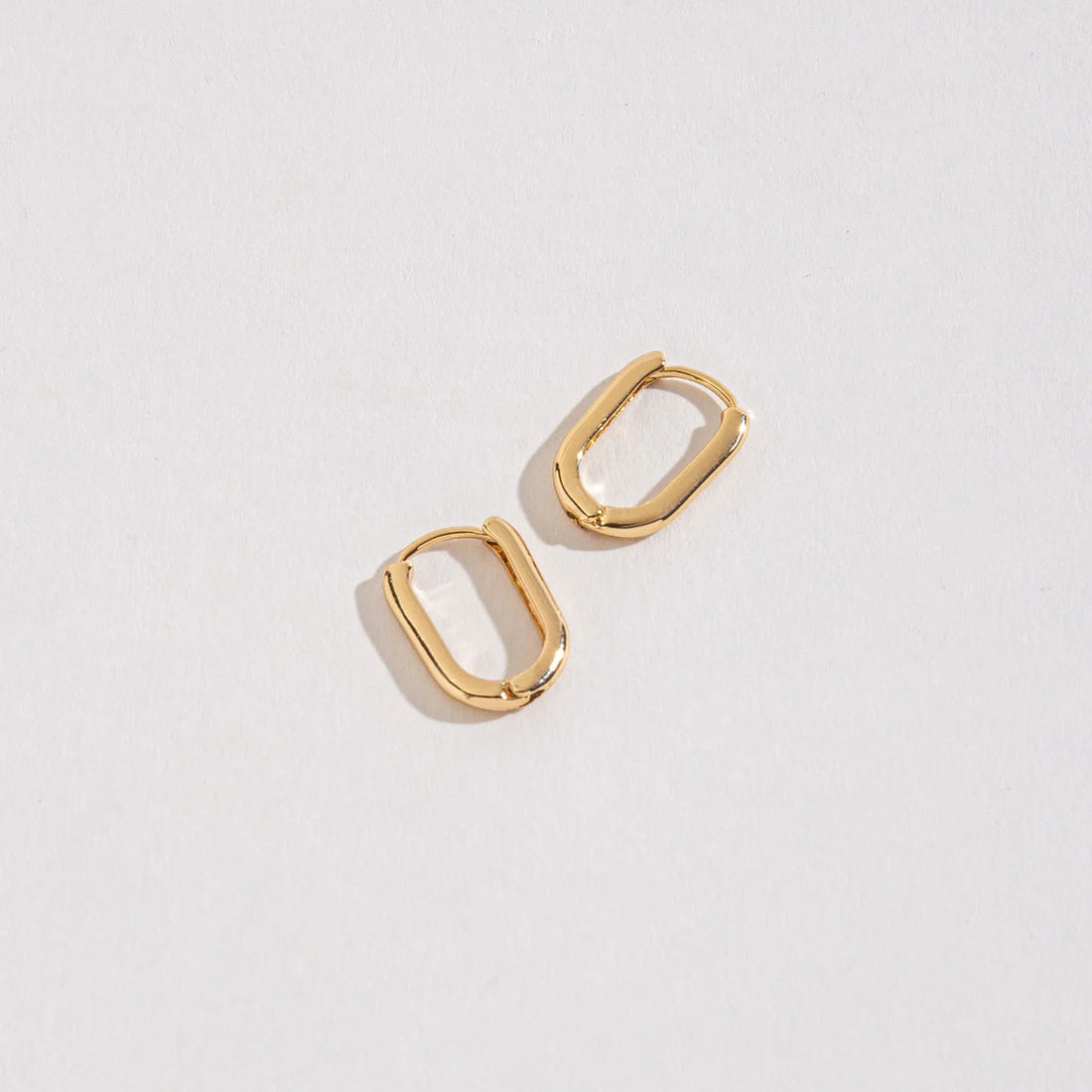 gold rectangular shape earrings.