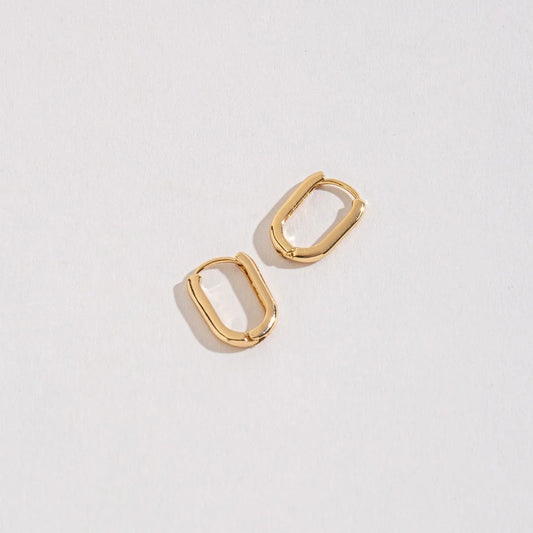 gold rectangular shape earrings.