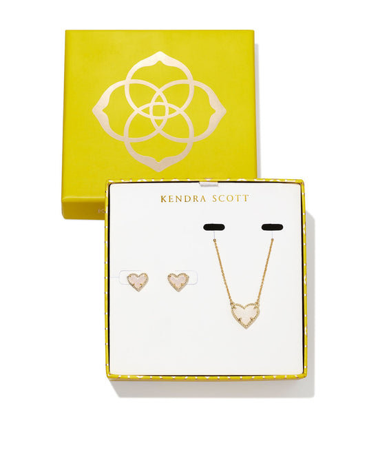 Show some love for your bestie, family member, or crush (we won’t tell!) with the Ari Heart Gold Pendant & Stud Gift Set in Iridescent Drusy. A sweet heart pendant and adorable stud earrings, this pair features sparkling iridescent drusy stone that is sure to make your loved one smile.