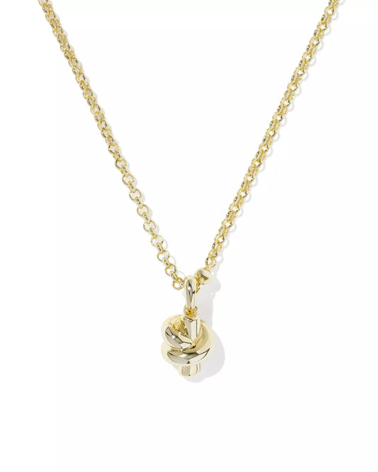Gold necklace with a sculptural knot pendant
