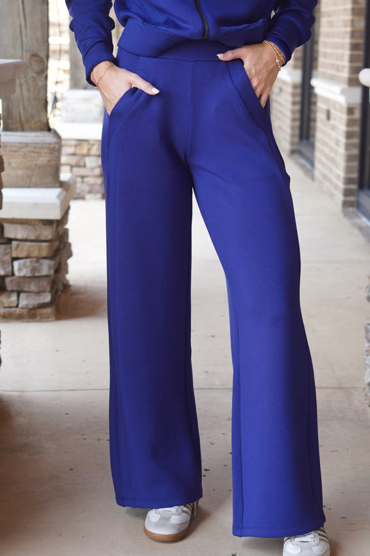 Spanx AirEssentials Wide Leg Track Pant, Mid-Rise: Sits at the natural waist with flat front waistband, Relaxed Fit, Navy blue
