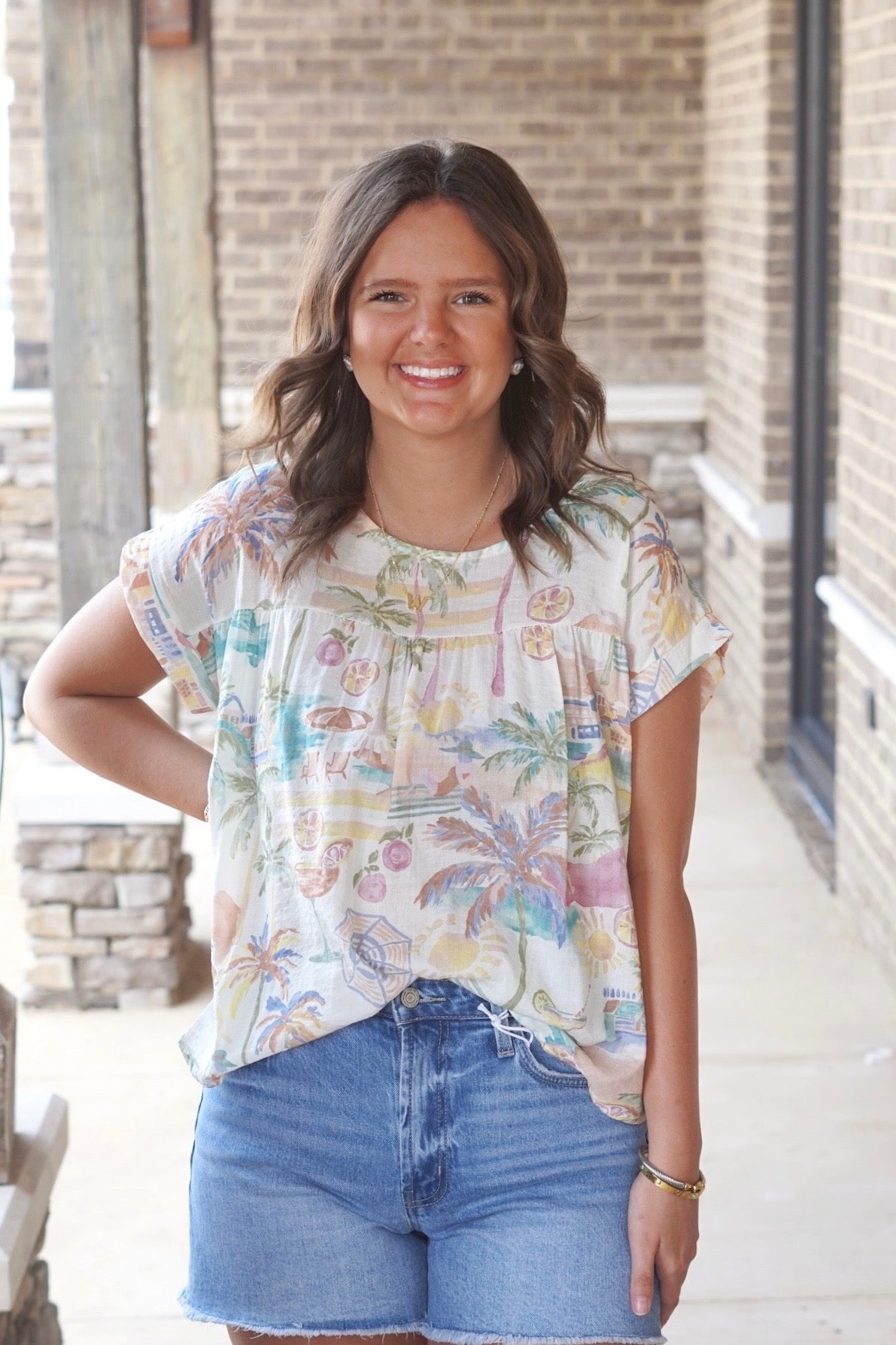 Short sleeve muted tropical printed top