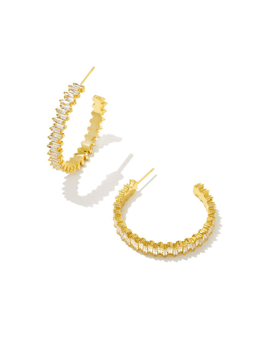 Make a statement in these edgy-meets-elegant hoops. The Juliette Gold Hoop Earrings in White Crystal feature glittering baguette crystals stacked to create a classic hoop silhouette.  Dimensions- 1.54"L Outer Diameter Metal- 14k Yellow Gold Over Brass Closure- Ear Post Material-  White Crystal