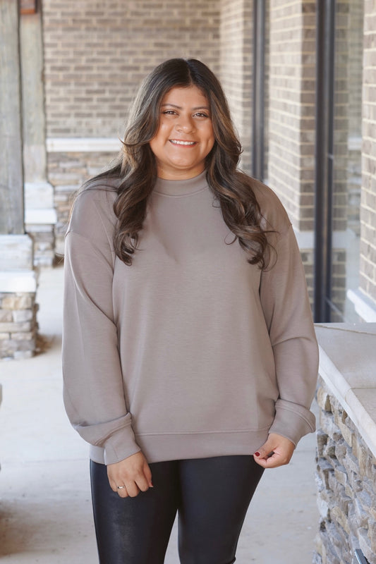 Sierra Scuba Mock Neck Pullover
Mock Neckline
Relaxed Fit/ Oversized
Long Sleeves
Color: Mocha
Full Length
Silky smooth and Lightweight