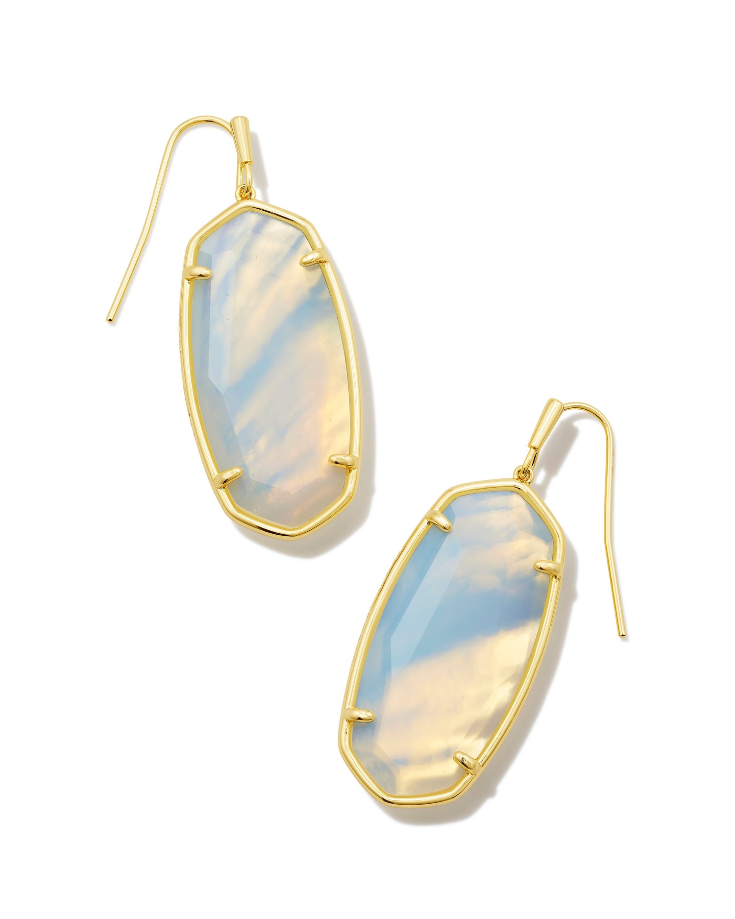 The Elle style you know and love shines brighter than ever in the Faceted Gold Elle Drop Earrings in Iridescent Opalite Illusion. A faceted stone face reflects light from all angles, letting our iconic silhouette radiate a gorgeous shine.