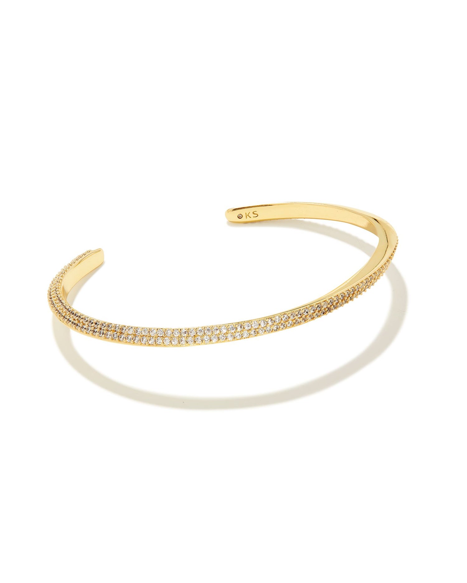 From the micro pavé crystals to its twisted metal design, the Ella Gold Cuff Bracelet in White Crystal is a showstopper that can’t be ignored. Elegant, upscale, and with just the right amount of sparkle, this bracelet will have you shining from all angles.