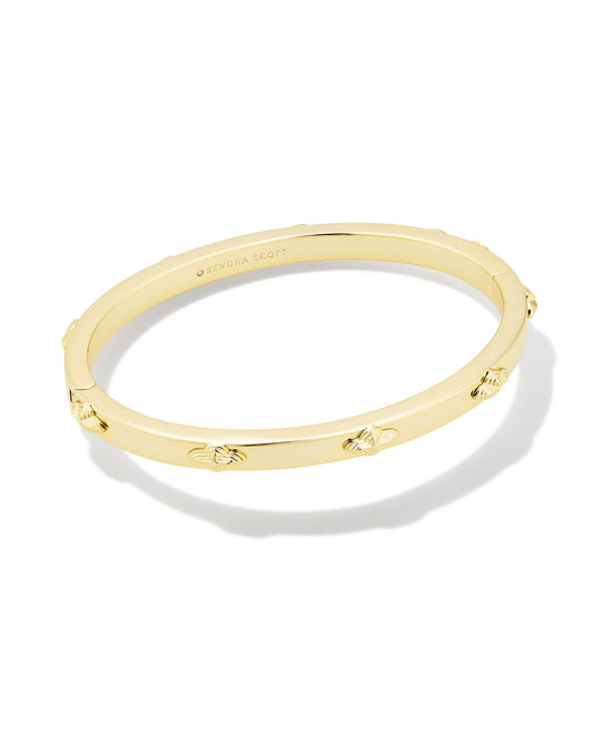 Build up your bracelet stack with the Abbie Metal Bangle Bracelet in Gold. This classic bangle features high-shine metal and a repeated motif of our Abbie shape, so it’ll pair perfectly with your other favorite bracelets. 