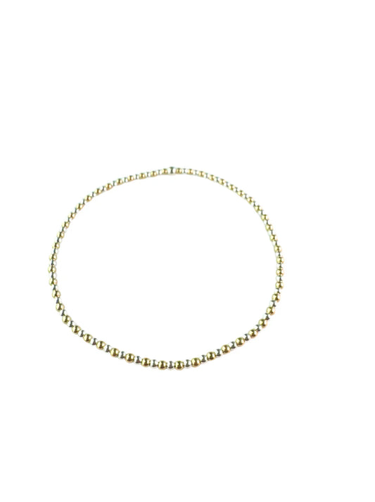 two tone gold beaded braceletMATERIALS: 14KG FILLED AND STERLING SILVER STRETCHY LENGTH: 6.5" OR 7"