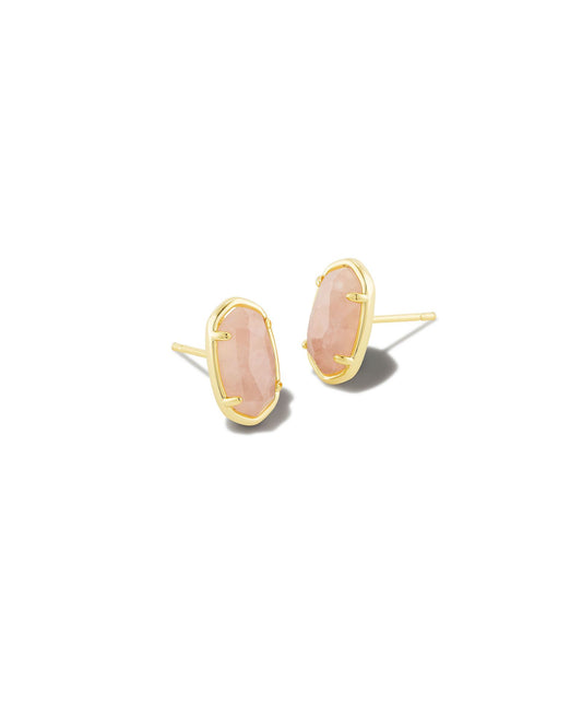 A polished pair of studs in our signature shape. The Grayson Gold Stud Earrings are sophisticated and unique, featuring our iconic silhouette inlaid with a genuine Rose Quartz stone A soft, blushing hue courtesy of the microscopic inclusions within, this genuine and undyed stone inspires love, healing, and nurturing.