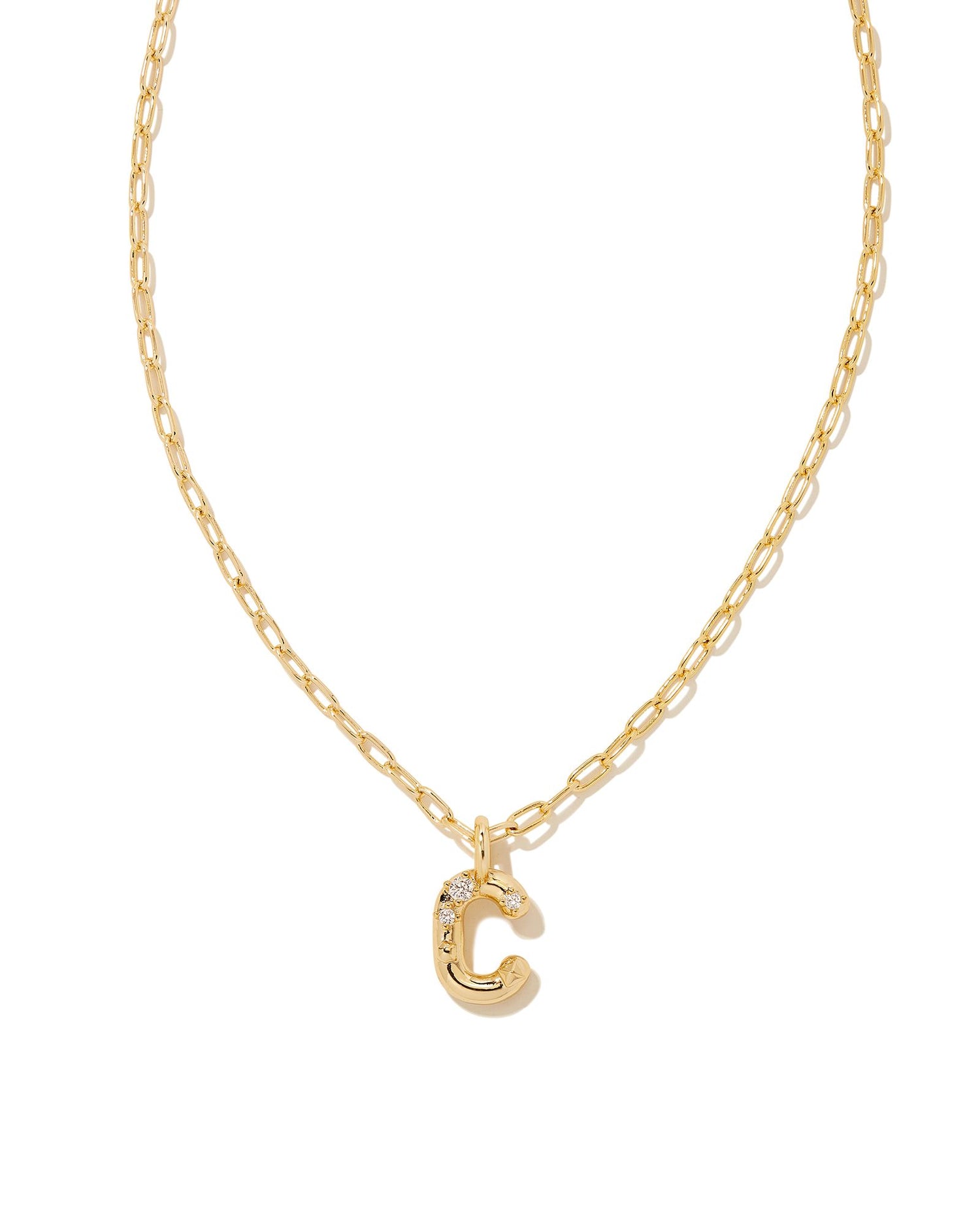 Personalize your everyday look with the Crystal Letter Short Pendant Necklace in White Crystal. Whether you’re rocking your initial or a loved one’s, this sentimental layer is one you’ll keep coming back to again and again.  Dimensions- 16' CHAIN WITH 3' EXTENDER, 0.62'L X 0.35"W PENDANT Metal- 14K Gold plated over brass Closure- Lobster Clasp Material-   White CZ Letter C