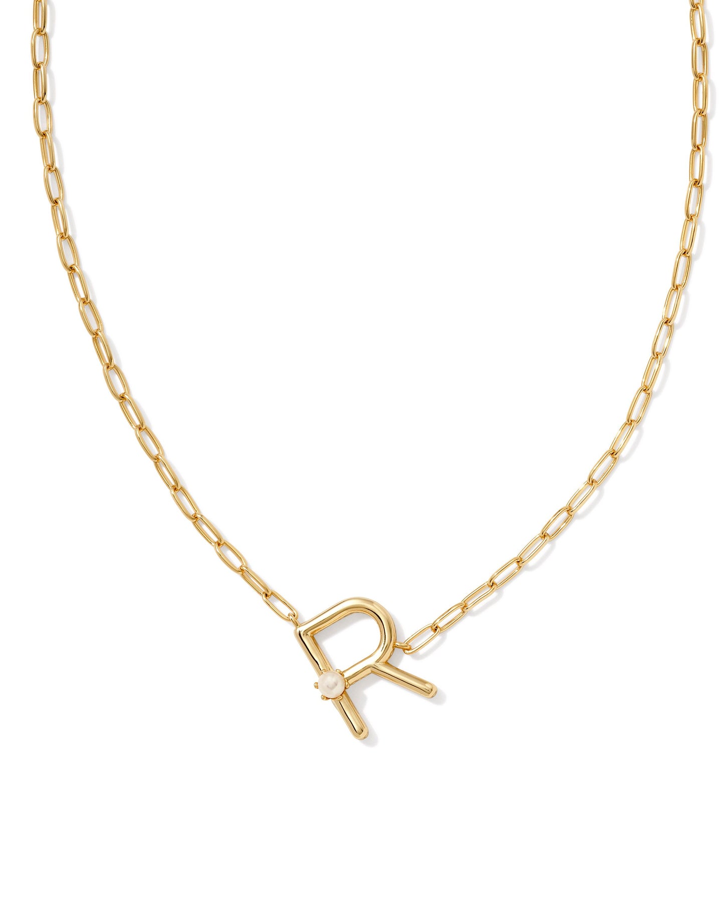 gold necklace with an initial pendant that has a singular pearl stud on it. Initial R