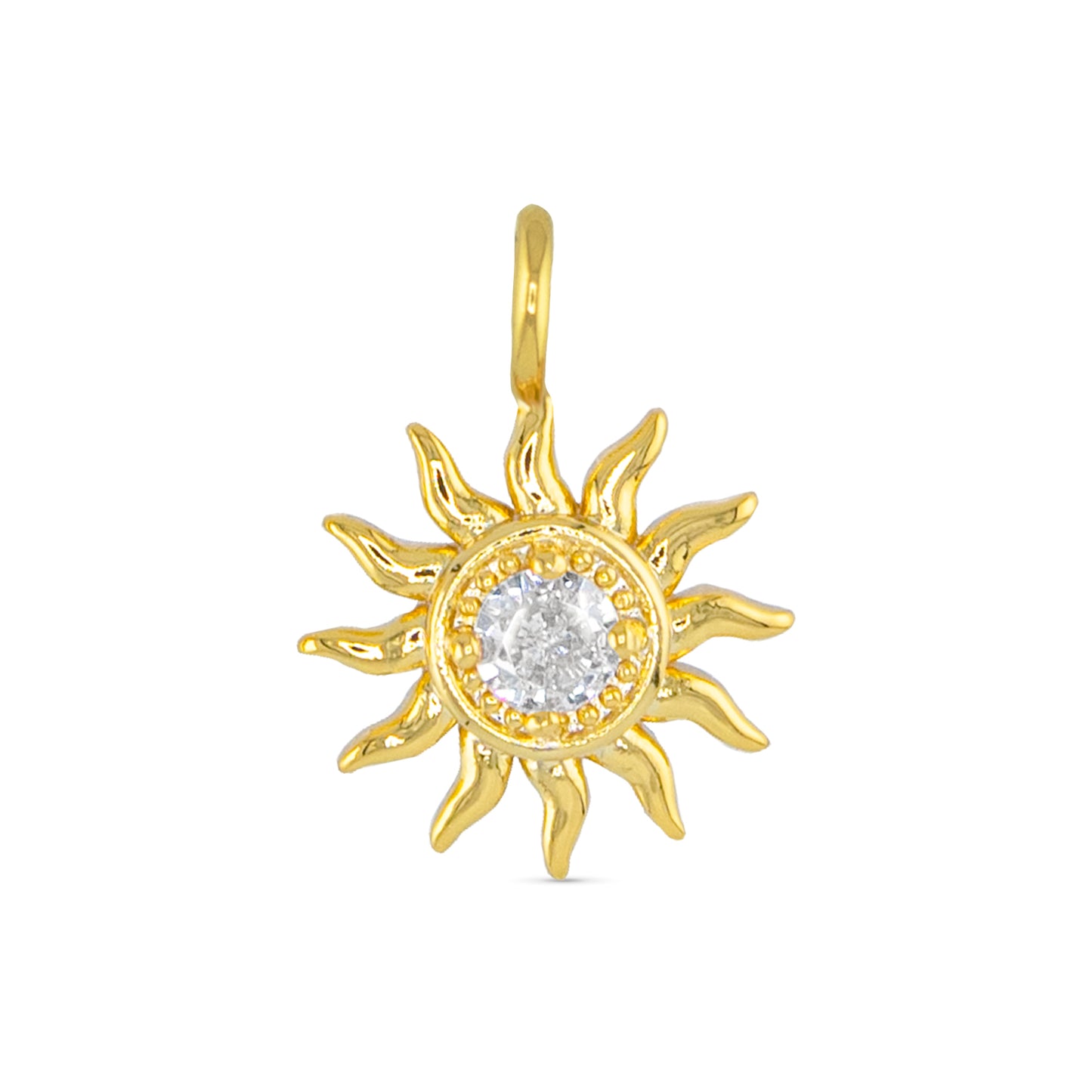 Gold necklace charm in the shape of a sun with a faux crystal in the center