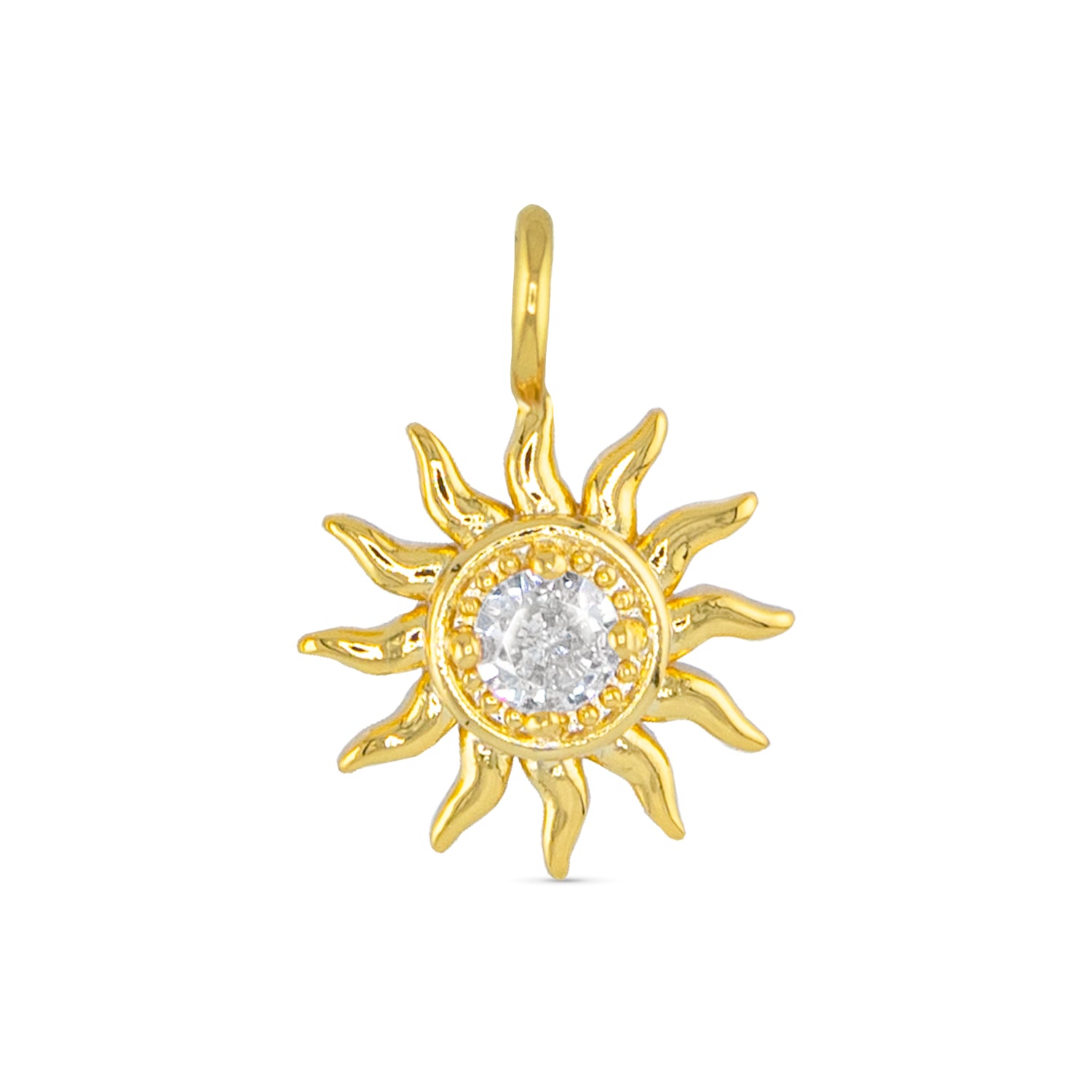 Gold necklace charm in the shape of a sun with a faux crystal in the center