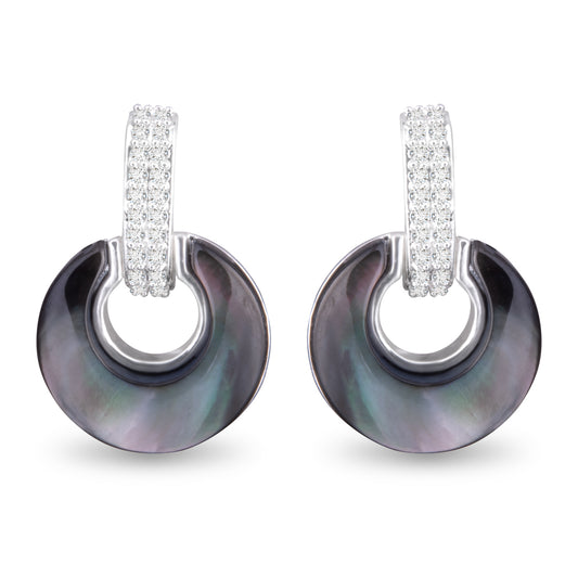 Silver hoop with faux crystals with open circles on the bottom part of them with a dark marble design on the open circle part