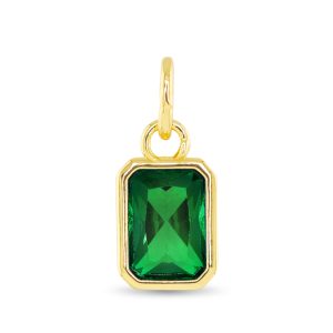 gold pendent with a emerald green stone in it