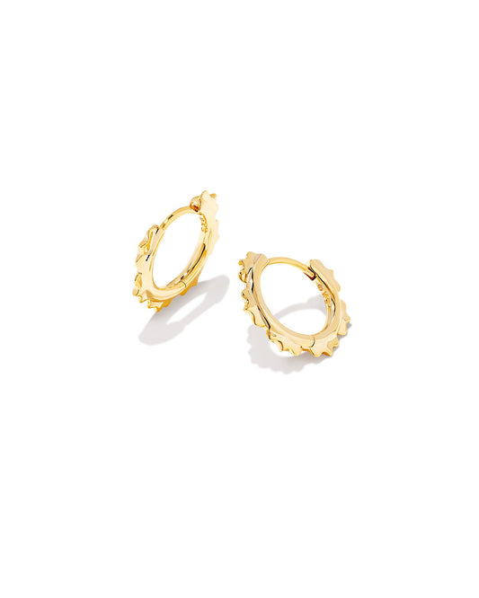 The trending huggie style meets intricate metal detailing in the Genevieve Huggie Earrings in Gold. Dainty and lightweight, floral-inspired metal shapes elevate these huggies for a truly unique style.  Dimensions- 0.58'L X 0.68'W Metal- 14K Gold plated over brass Closure- Ear Post
