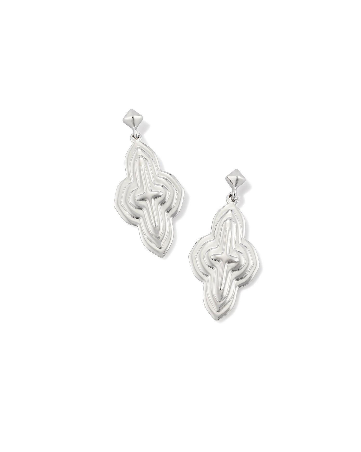 Say hello to the Abbie Metal Drop Earrings, your new wear-anywhere pair. These all-metal earrings feature elongated motifs of our iconic medallion for a multidimensional effect. Perfectly face-framing, these earrings will complement any look. Silver!