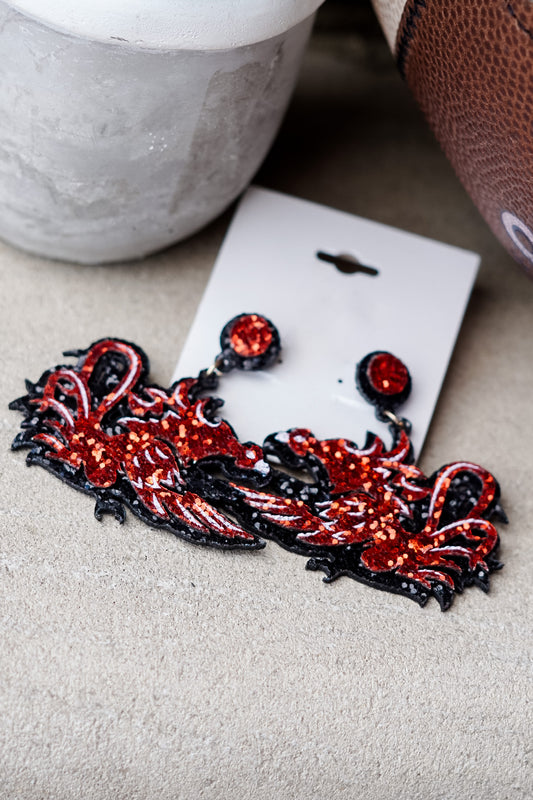 Game day with the Gamecocks!! Are you missing your perfect Jax State accessory? Look no more!! Go Gamecocks!!  Game Day Gamecock Earrings Stud Post Back. Black background with red beaded "Gamecocks".
