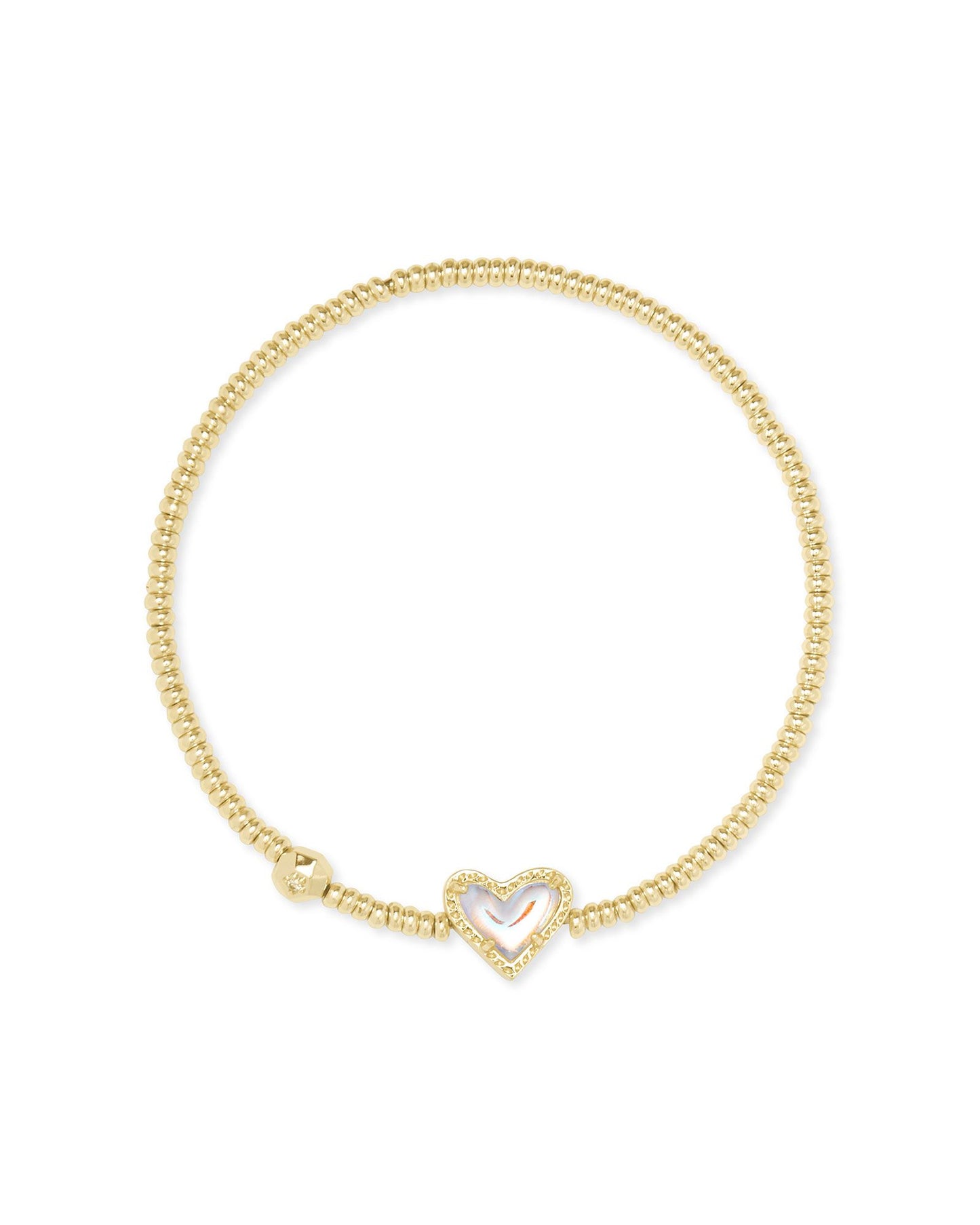 Like wearing your heart on your sleeve? Then the Ari Gold Heart Stretch Bracelet is perfect for you. Designed to fit any wrist, this minimal-yet-playful bracelet is the easiest way to bring some love and shine to your everyday stacks. Gold Ivory Mother of Pearl