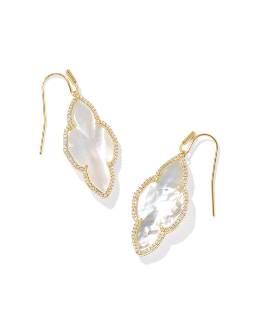 14K Yellow gold over brass drop earrings. Earring pendant is in the shape of "abbie" stone. Stone is ivory mother of pearl. 1.6'Length X 0.65"Width