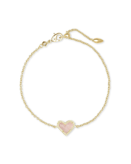 Wear your heart on your wrist with the Ari Heart Chain Bracelet. This asymmetrical design shines solo, but functions just as well as part of your everyday stack.