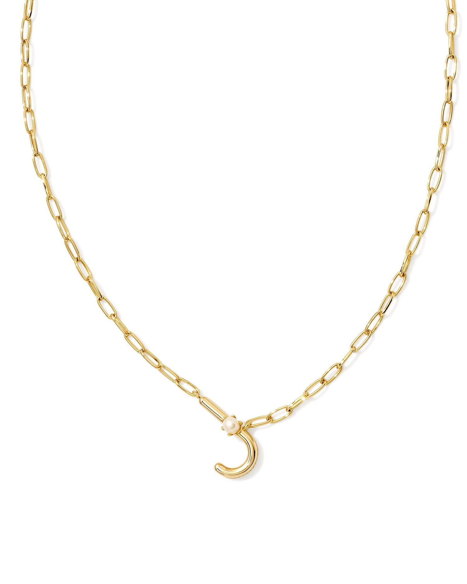 gold necklace with an initial pendant that has a singular pearl stud on it. Initial J