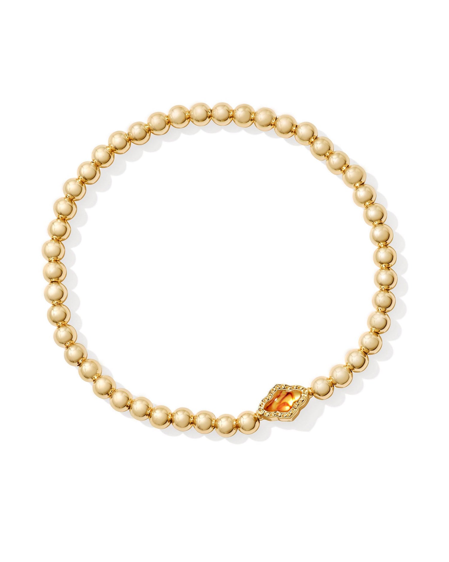 gold beaded bracelet with a marble amber illusion stoned pendant