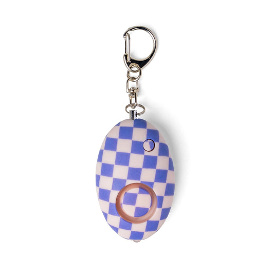 Purple and white checkered mini keychain alarm on display. 