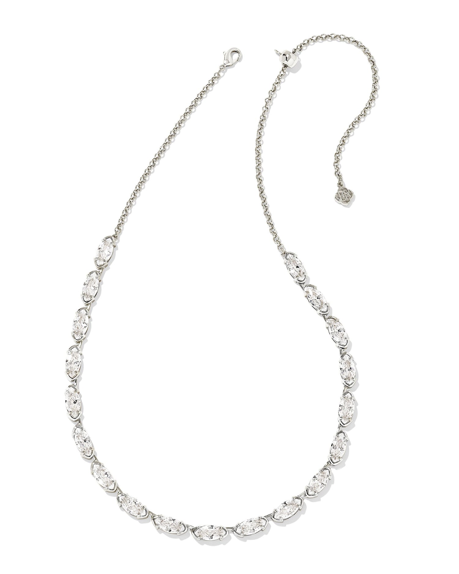 Hello, sparkly stunner! Featuring a bold chain studded with crystals, the Genevieve Strand Necklace in White Crystal adds that “wow” factor to your outfit, making it perfect for every standout occasion.  Dimensions-16' CHAIN WITH 3' EXTENDER,0.15'W Metal- 14K Gold plated over brass(Gold), Rhodium Over Brass (Silver) Closure- Lobster clasp w/ single adjustable slider bead Material- White CZ This one is silver