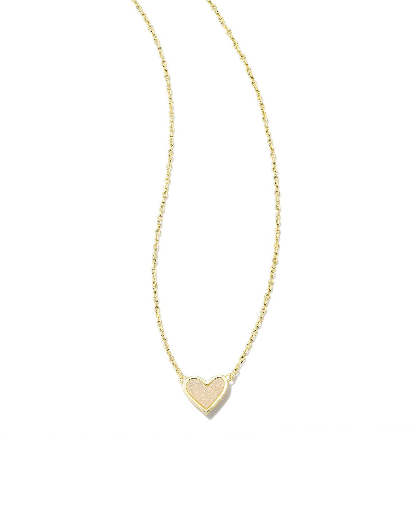 The bestseller you know and love, now in a flirty new design! The Framed Ari Heart Gold Short Pendant Necklace in Gold Iridescent Drusy