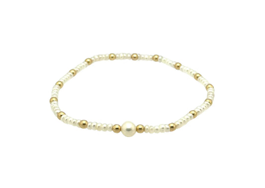 Gold Filled Bracelet With Pearl BALL BEAD MATERIALS:&nbsp;&nbsp;14K GOLD FILLED, STERLING SILVER OR ROSE GOLD BEAD SIZE: 3MM | FRESHWATER PEARLS 5MM STRETCHY LENGTH:&nbsp;6.5" OR 7" CLASP LENGTH:&nbsp;6" + 1.5" EXTENSION HIGH PERFORMANCE ELASTIC MADE IN MIAMI, MADE WITH LOVE