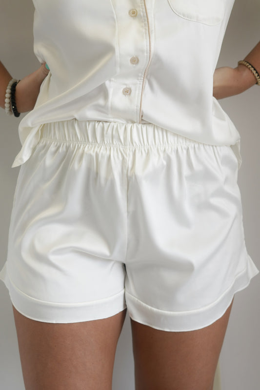 Satin Ruffle PJ Shorts, Elastic Waistband, Shorts, Subtle Ruffle Trim, 2 Inch Inseam, Loose Fit
Colors: Cream
95% Polyester, 5% Spandex