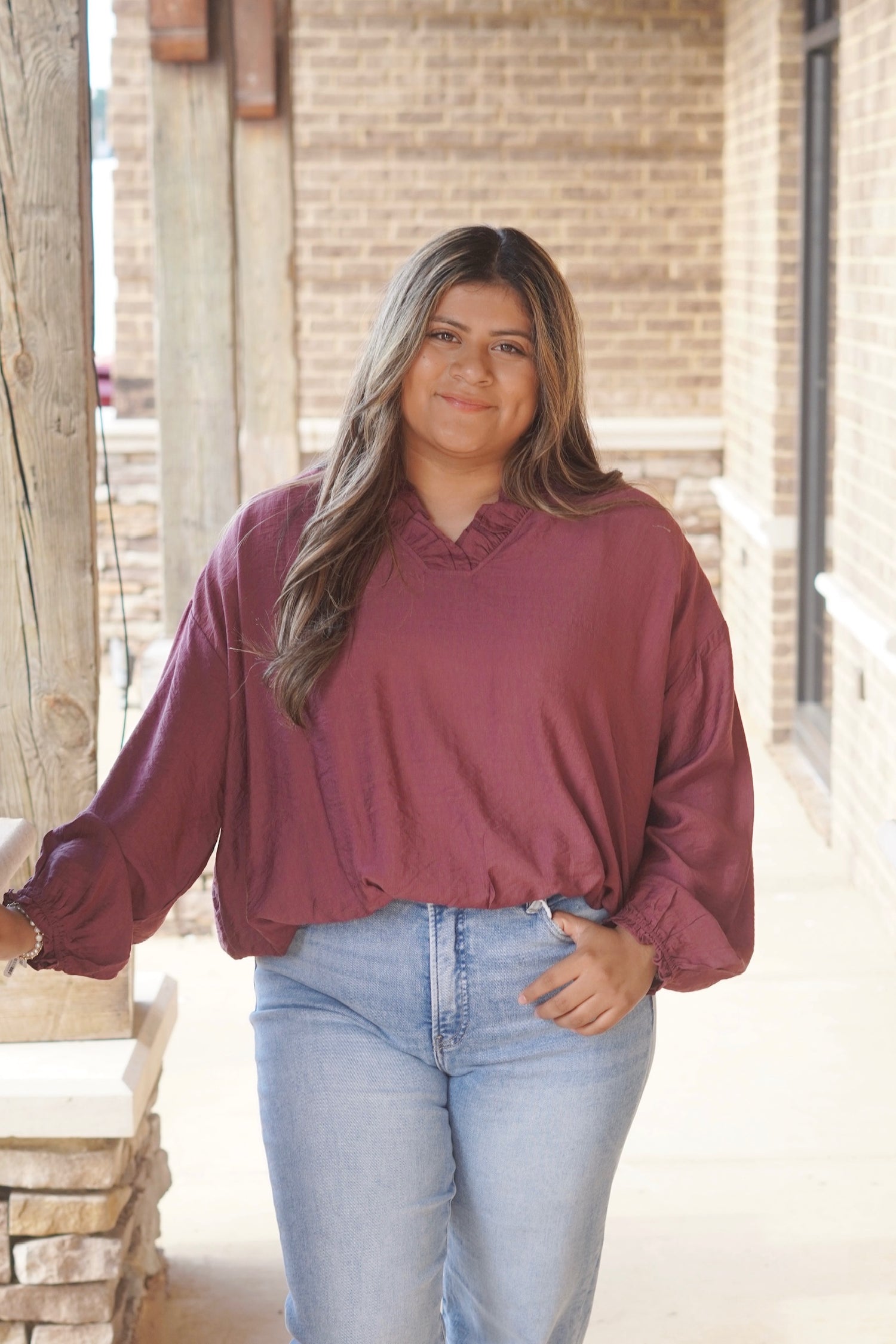 Merlot Long Sleeve Blouse, Long Sleeves, Split Neckline, Color: Merlot, Relaxed Blouse, Cinched Hemline. 