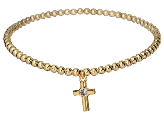 gold beaded bracelet with cross charm