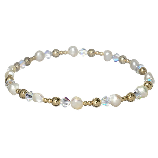 pearl crystal and gold beaded bracelet MATERIALS: 14K GOLD FILLED, 14K ROSE GOLD FILLED, OR STERLING SILVER STONES: FRESHWATER PEARL & CRYSTALS BALL BEAD SIZE: 2MM & 4MM STRETCHY LENGTH: 7"